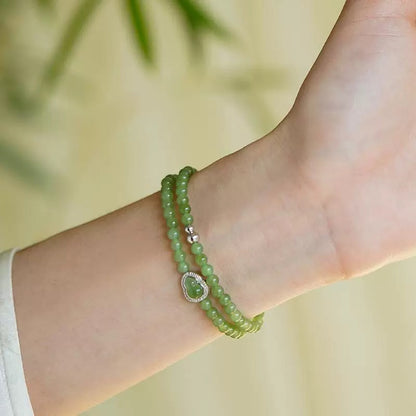Serene Calabash Jade Bracelet
－ Natural Hetian Jade Beaded Bracelet (Fresh Apple Green, Neo-Chinese Elegance)