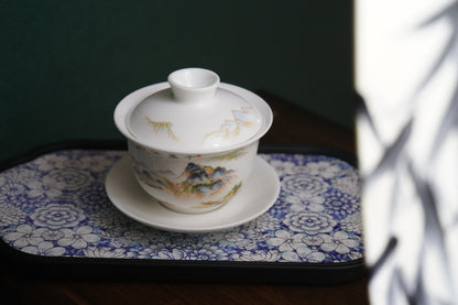 White porcelain hand-painted covered bowl