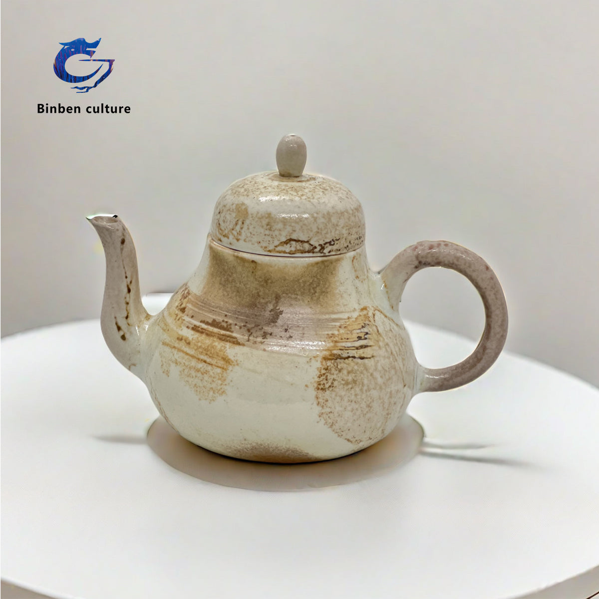 Lian Tingting Teapot Type: Pear shaped Pot Glazed Surface: Falling Ash Burner