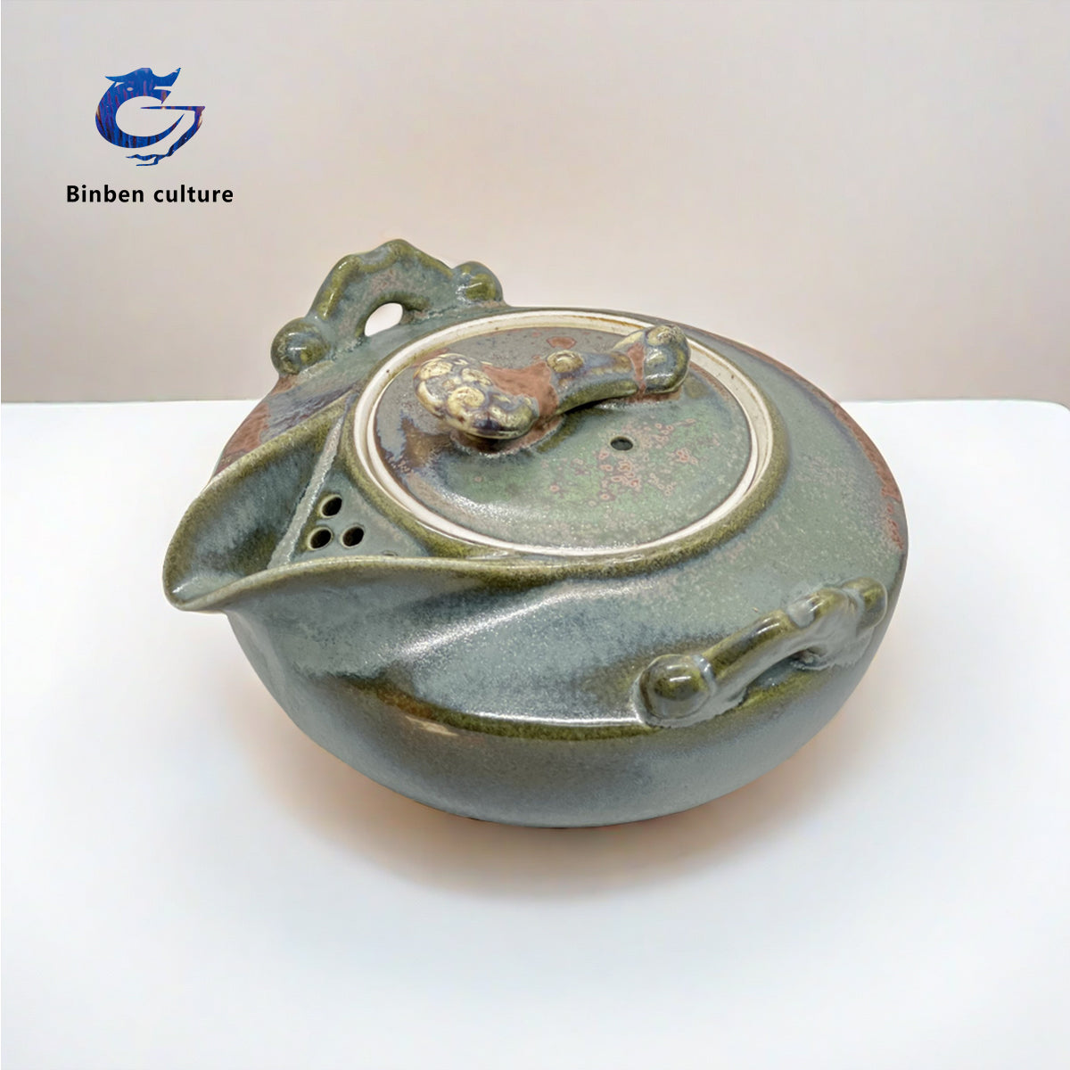 Lian Tingting Teapot Type: Hand held Pot Glazed Surface: Falling Ash Burned